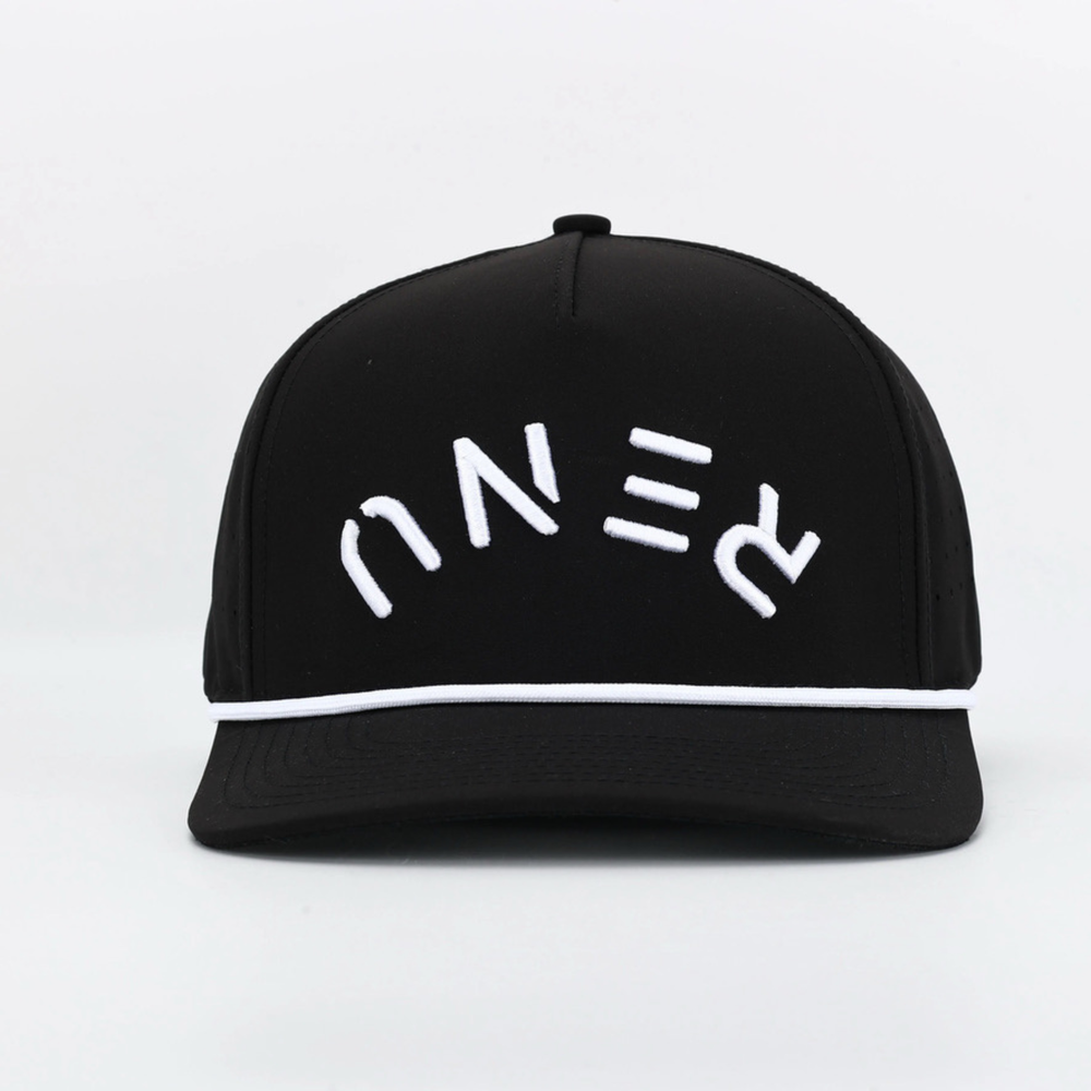 Black cap with white embroidered abstract design and white trim, labeled Invert Black.