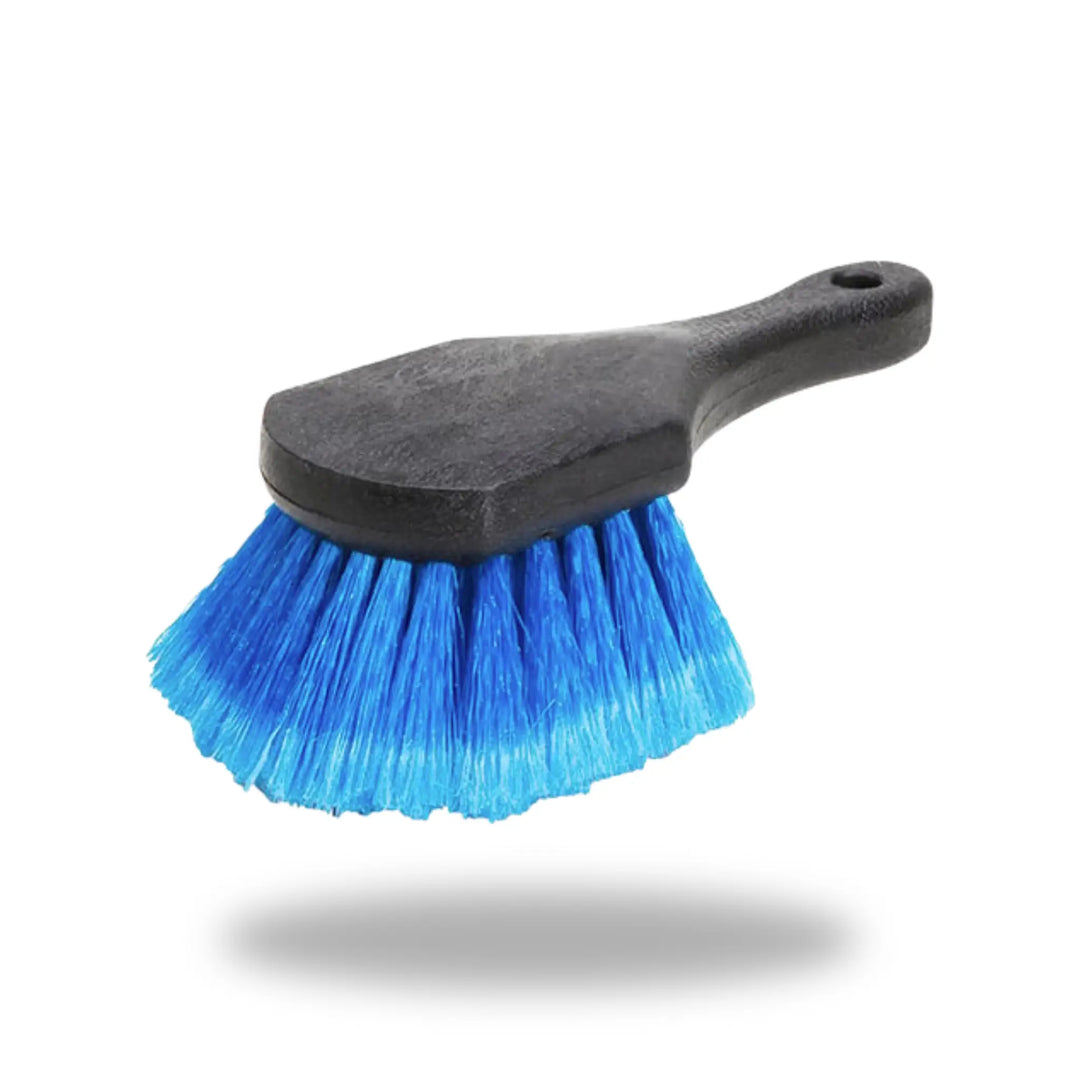 Blue Flagged-Tipped Brush with black handle and vibrant blue bristles angled for effective cleaning tasks.