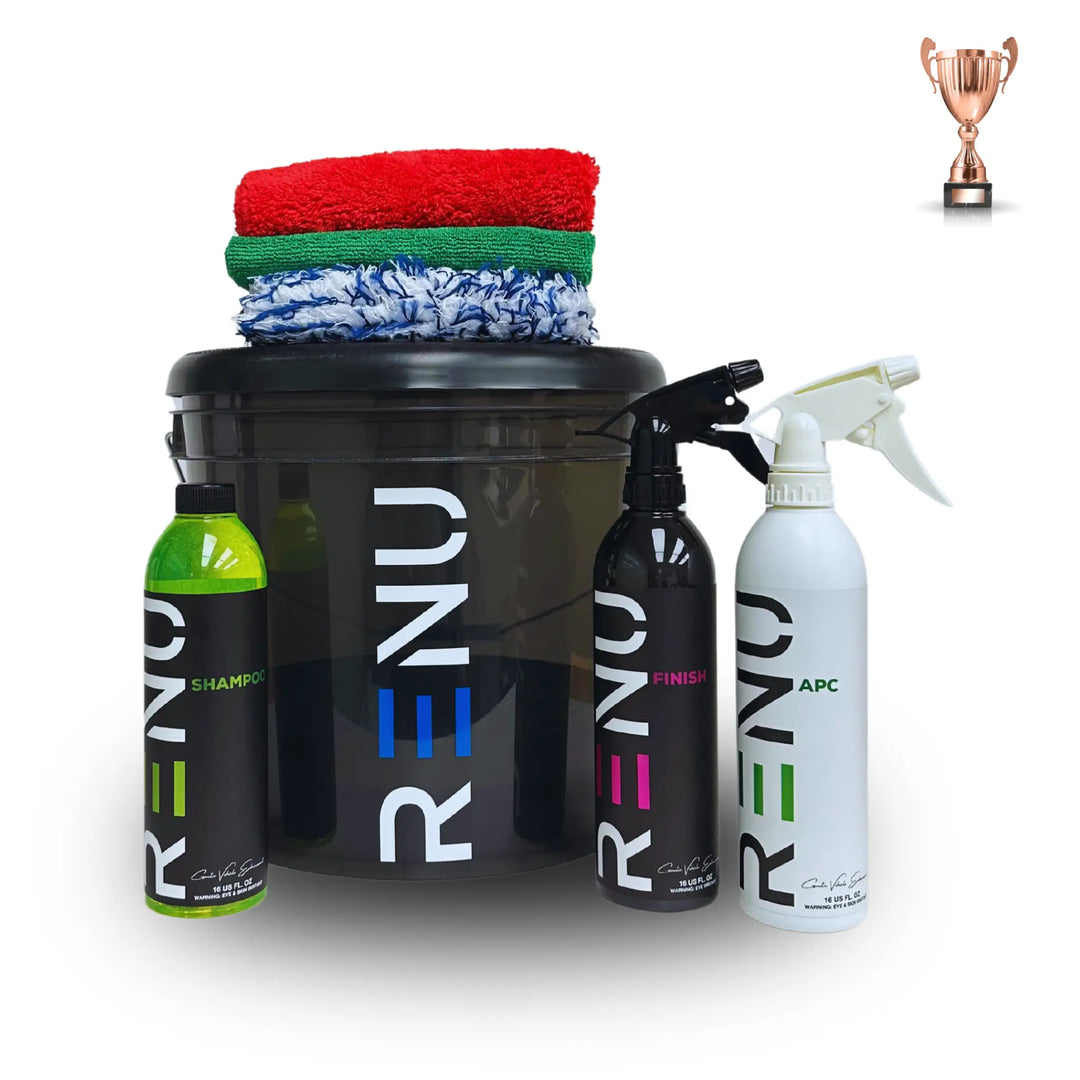 Bronze Car Care Kit with shampoo, finish spray, APC cleaner, black bucket, and three microfiber towels in red, green, and blue