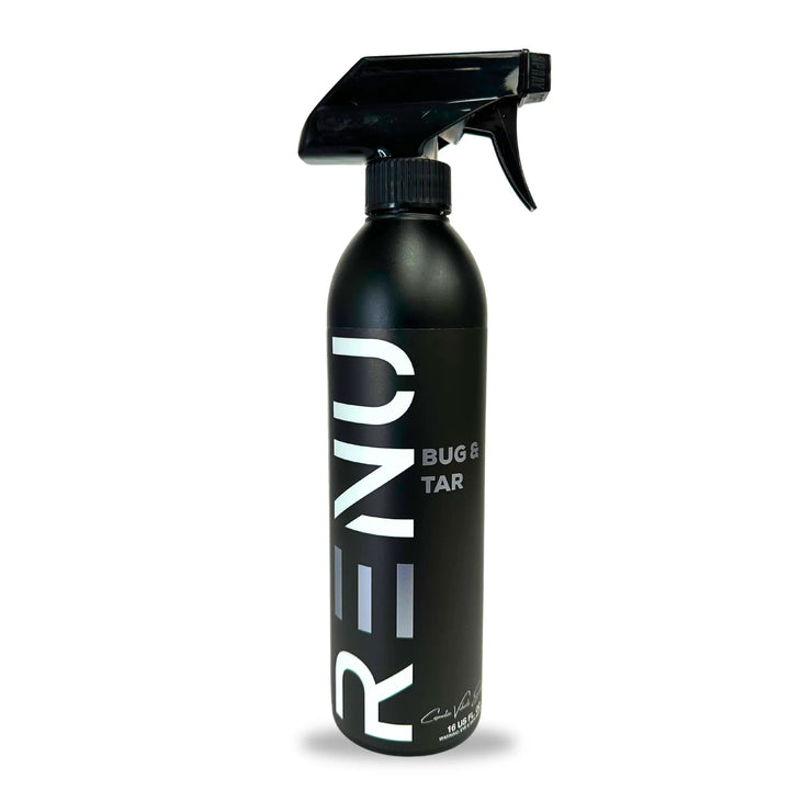 Black spray bottle labeled Bug + Tar with nozzle for cleaning or removing substances from surfaces