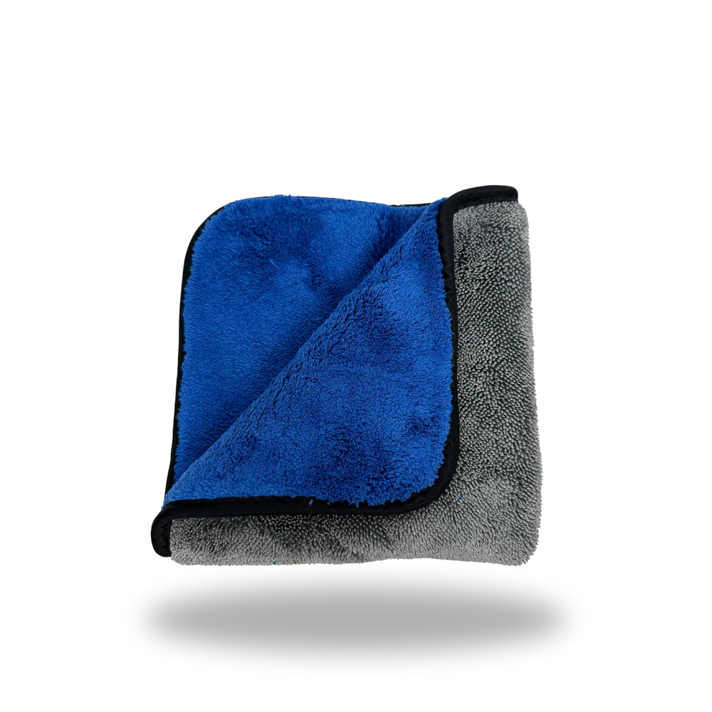 Dual-Faced Twisted Loop & Fleece Polishing Towel folded showing blue fleece side and gray twisted loop side with black trim.