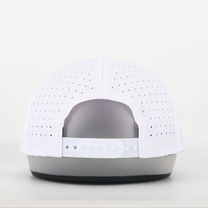 Back view of a white perforated adjustable Finish Line Series Hat - White on a display stand.