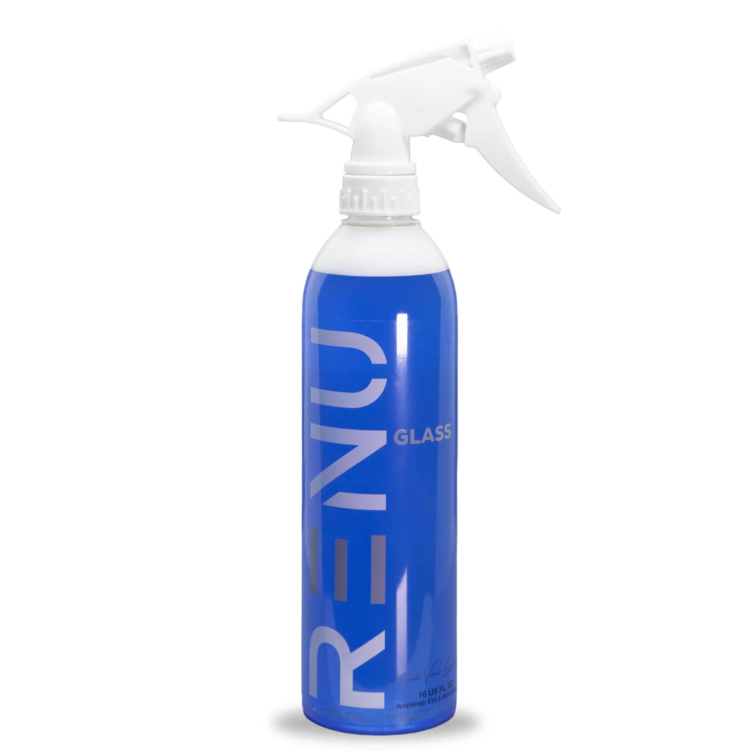 Blue spray bottle labeled GLASS with white trigger nozzle for cleaning or treatment use