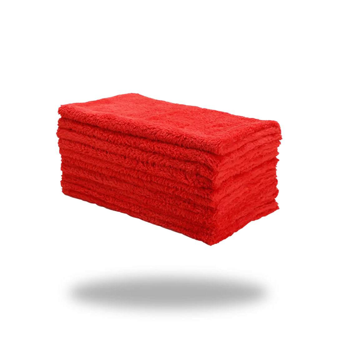 Stack of vibrant red microfiber towels neatly folded, representing Red Finishing 450 Microfiber Towels product.