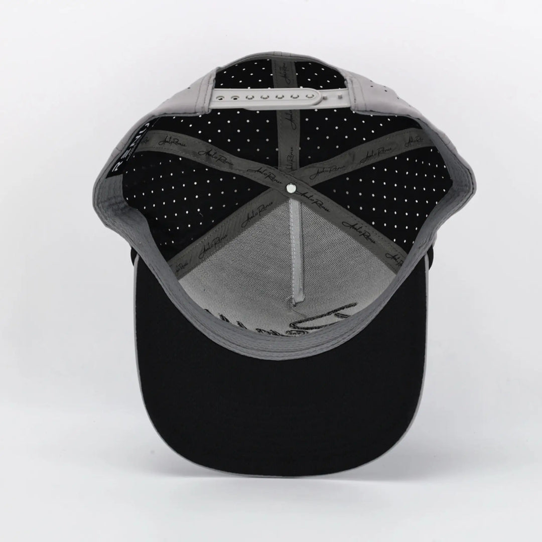Inside view of a Script Grey cap showing black adjustable strap and inner sweatband with branded tape detailing.