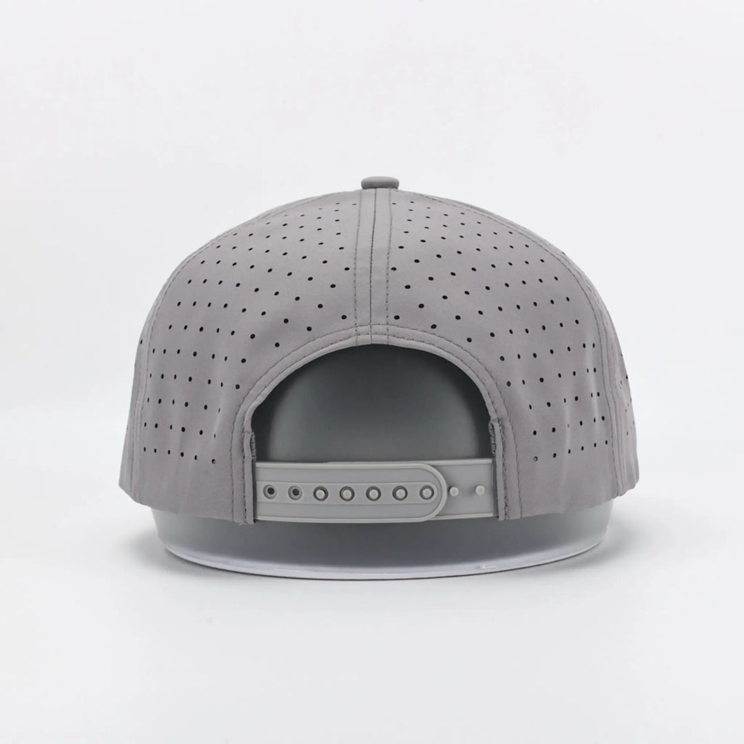 Back view of a Script Grey perforated adjustable snapback cap on a display stand against a white background