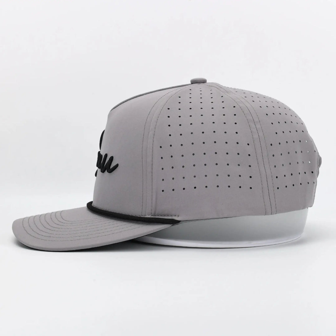 Script Grey cap with perforated panels and black embroidered logo on front in modern sporty style