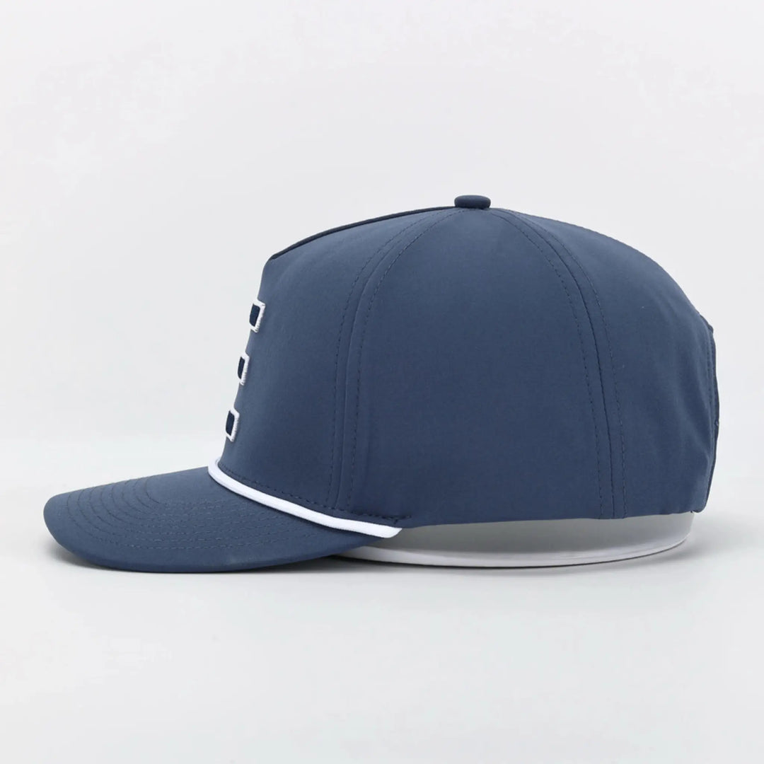 Signature Blue cap with white trim and front embroidered design shown from the side on a white background