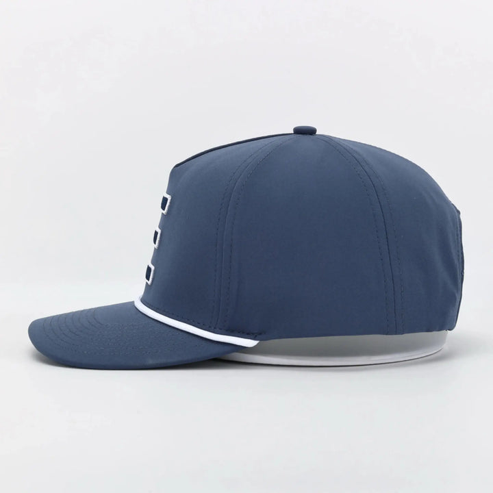 Signature Blue cap with white trim and front embroidered design shown from the side on a white background