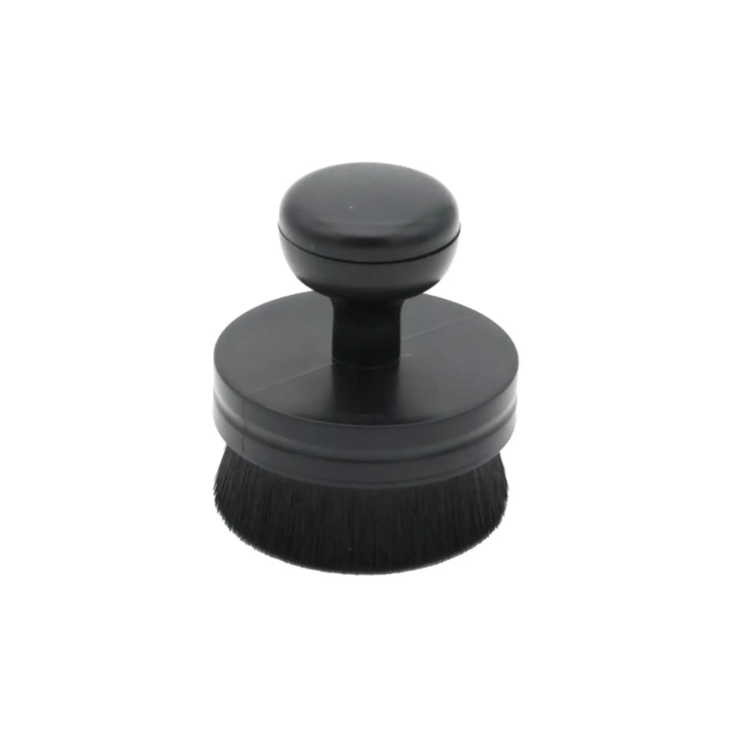 Black round Tire &amp; Trim Applicator Brush with soft bristles and ergonomic handle for easy grip and application.