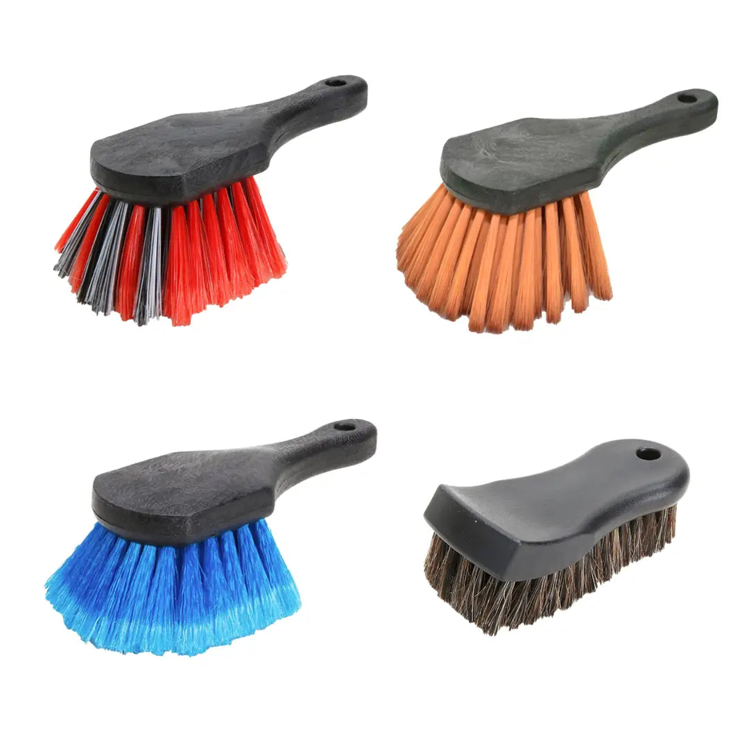 Four different colored brushes with black handles included in the RENU Ultimate Detail Brush Kit for cleaning tasks.