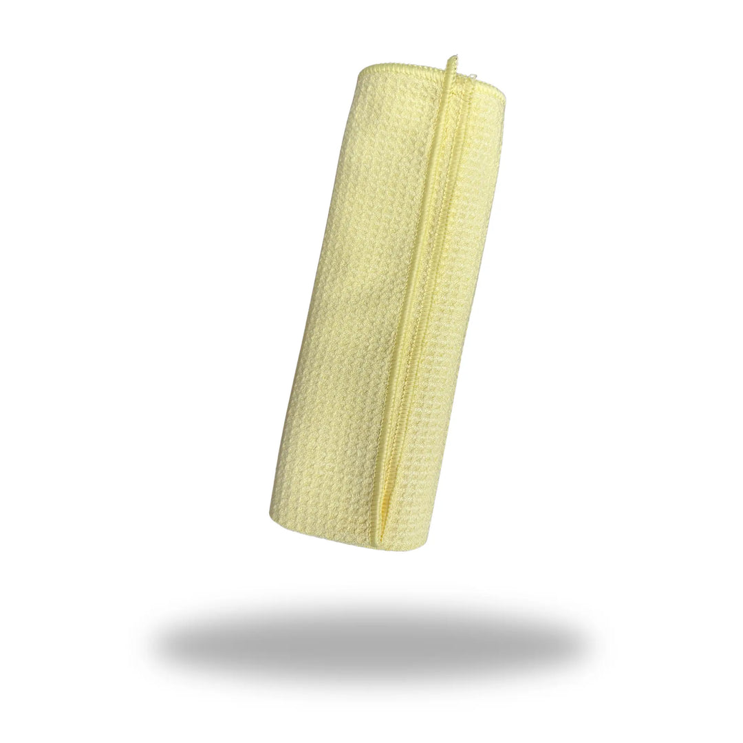 Waffle Weave Drying Towel 22x30 rolled up in pale yellow with textured waffle weave fabric and hanging loop